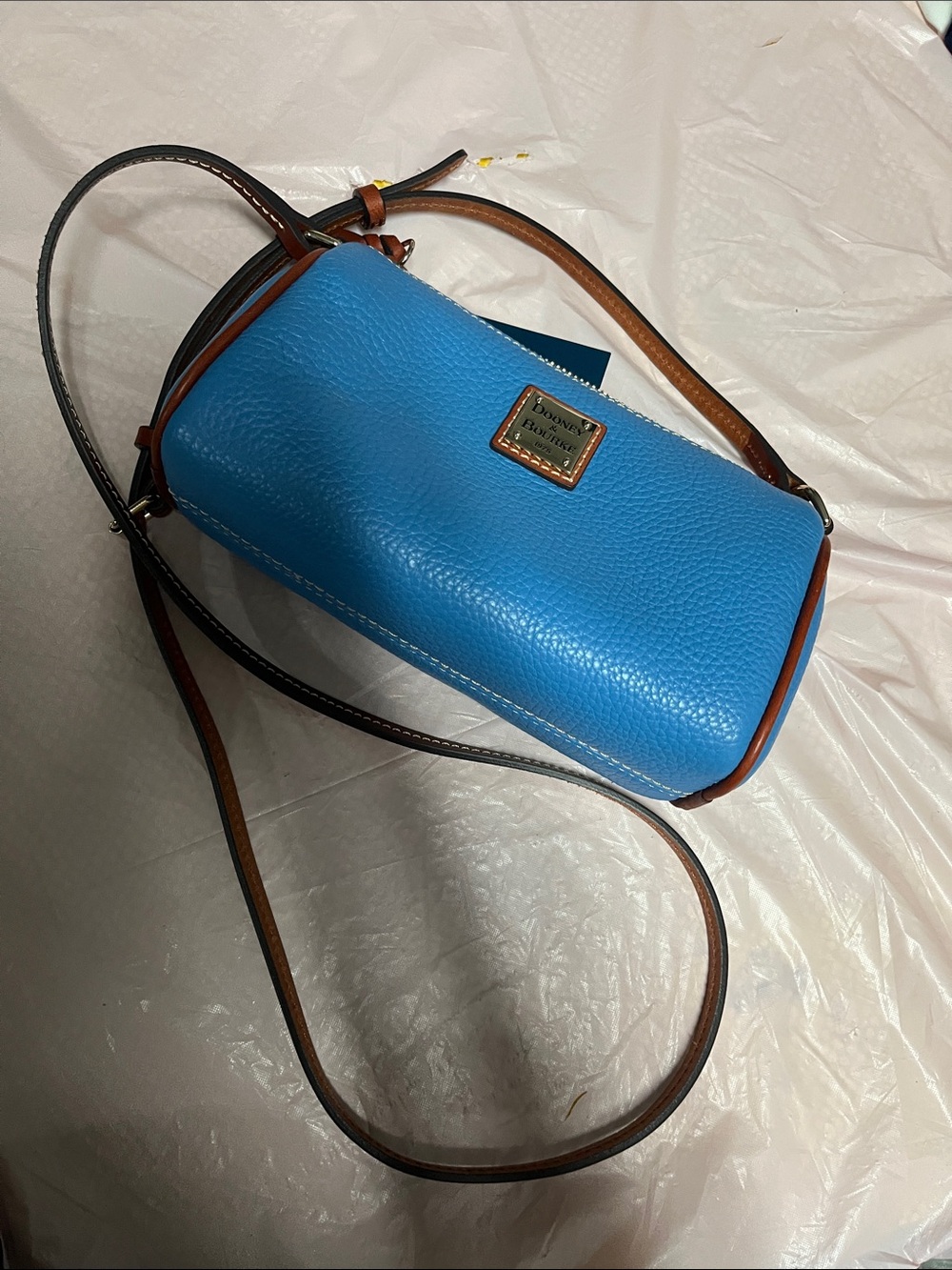 Dooney & Bourke Pebble Leather Crossbody in Bright Blue with Brown Trim